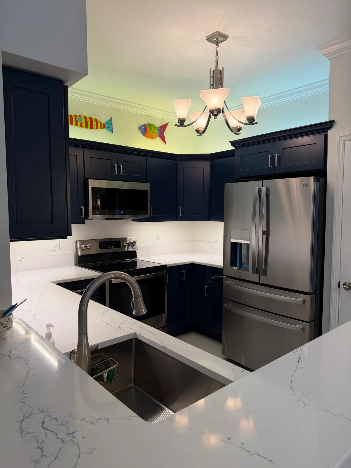 Navy shaker kitchen with a full stainless appliance package, Bonita Springs