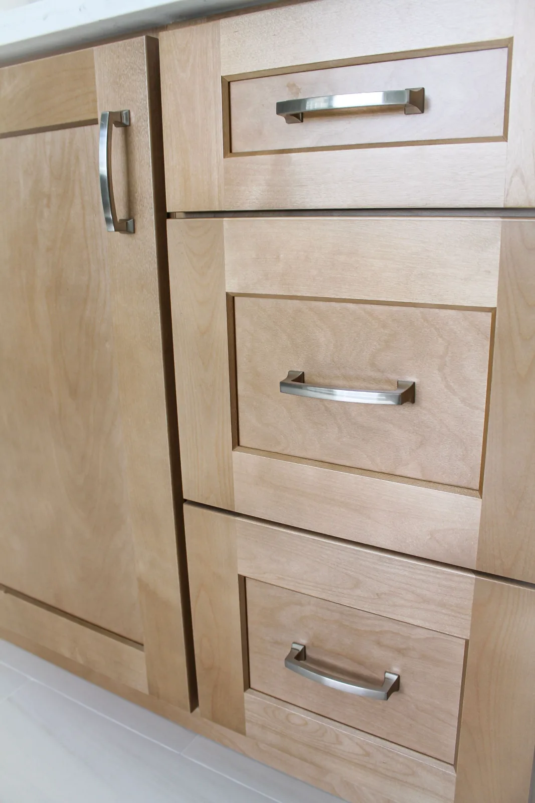 Honey oak shaker vanity drawers with brushed nickel bar pulls