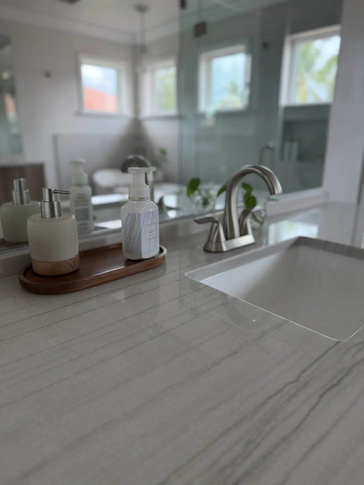 Brushed nickel faucet on a quartz vanity top, Fort Myers