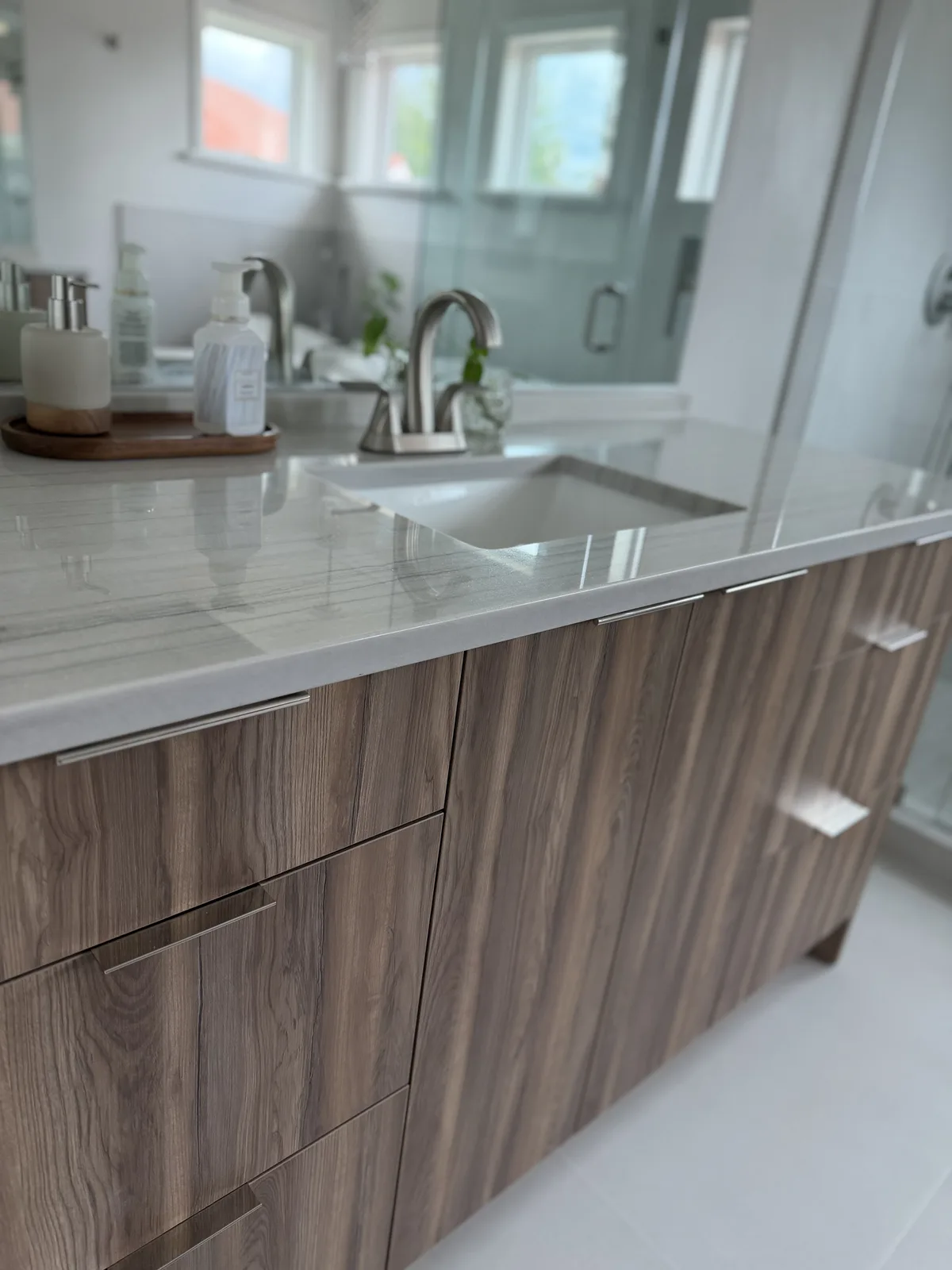 Walnut wood-grain floating vanity with full-extension drawers, Fort Myers