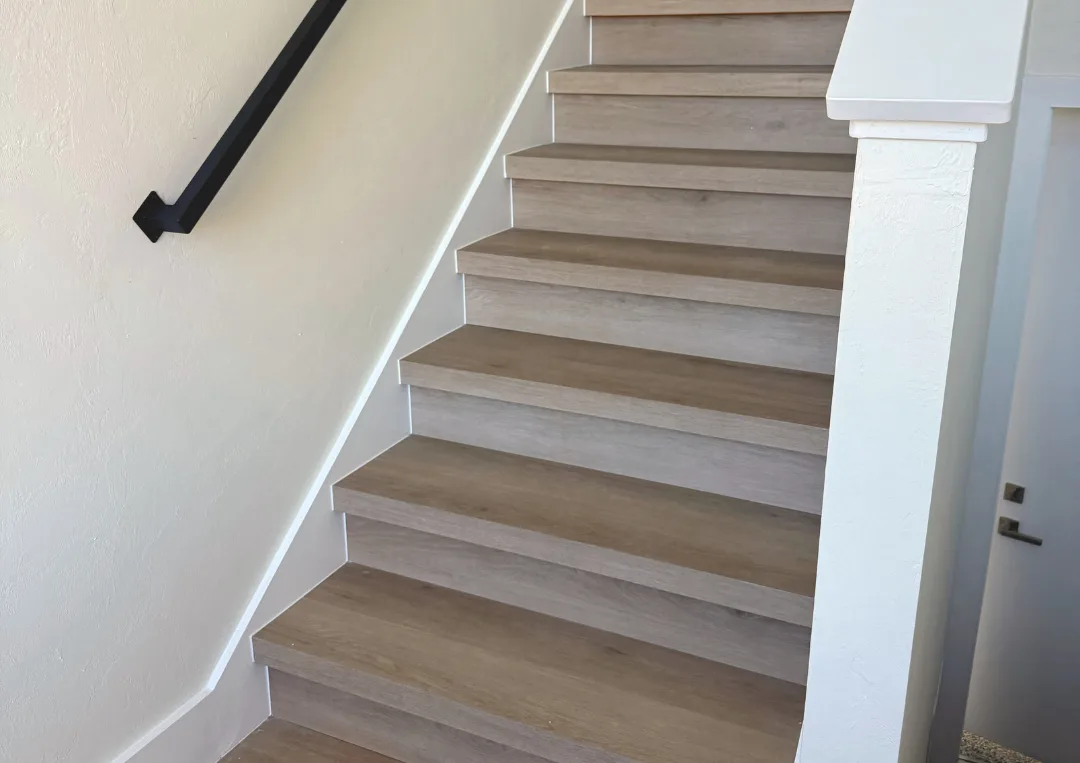 Vinyl plank stairs replacing carpet in Fort Myers